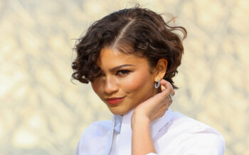Zendaya Debuts Rumored Wedding Band With Milky Manicure and Vintage Curly Bob